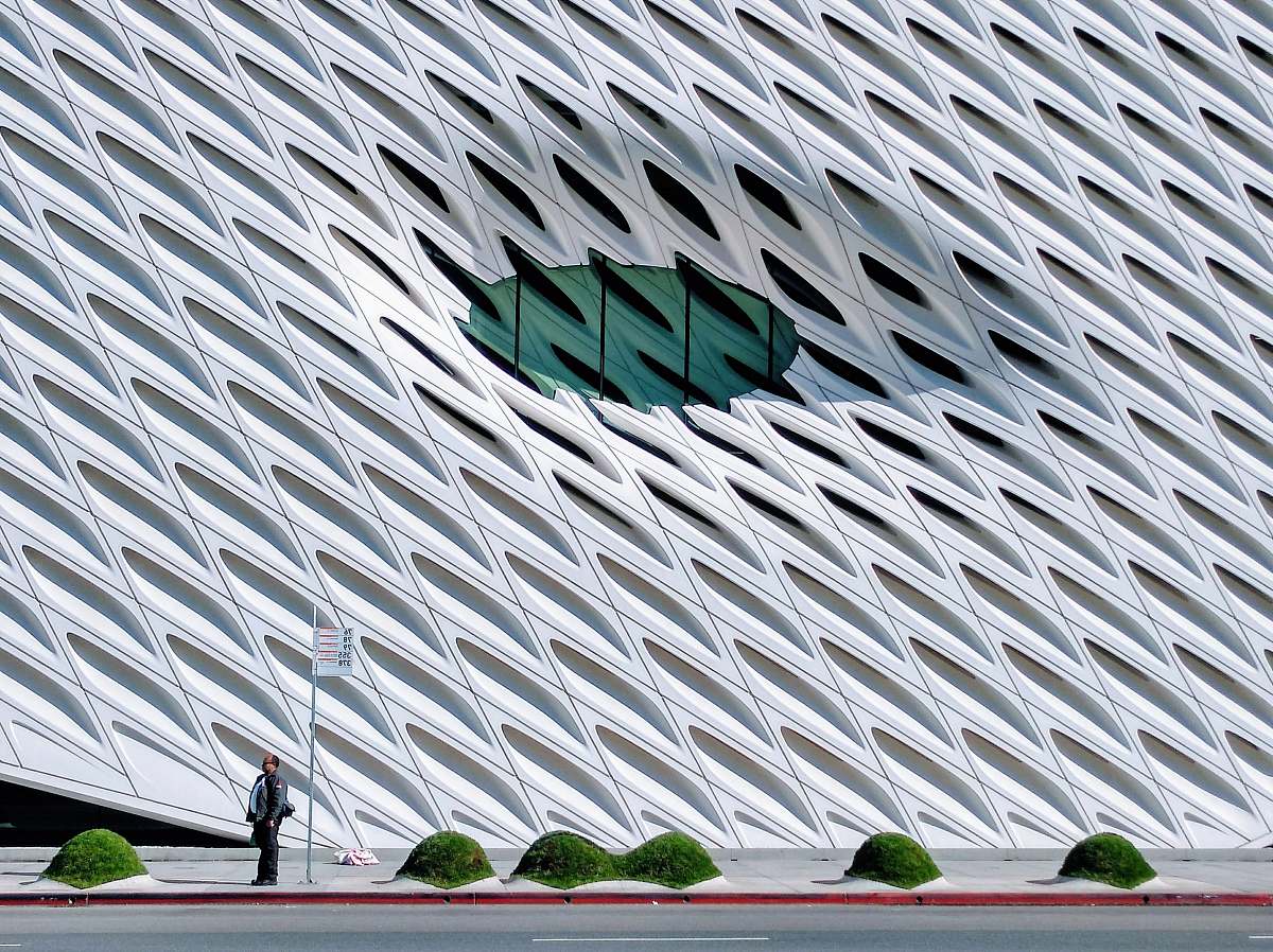 united states man standing near road side roof